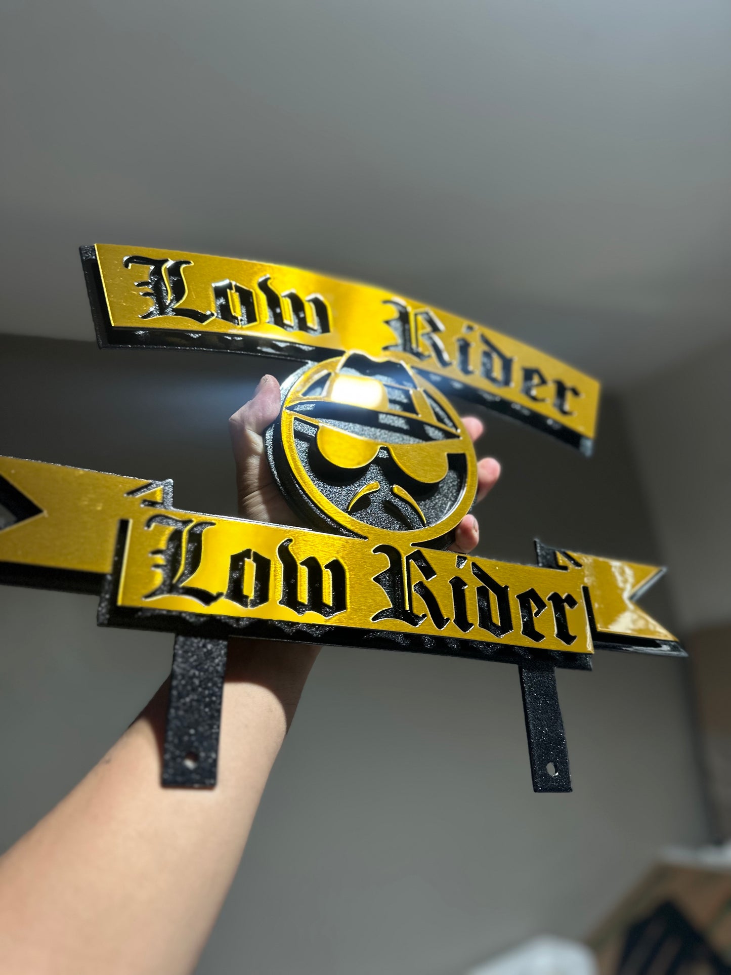 LOWIDER PLAQUE W/ LOWRIDER POWDER COATED BLACK AND GOLD 17x12 Inches