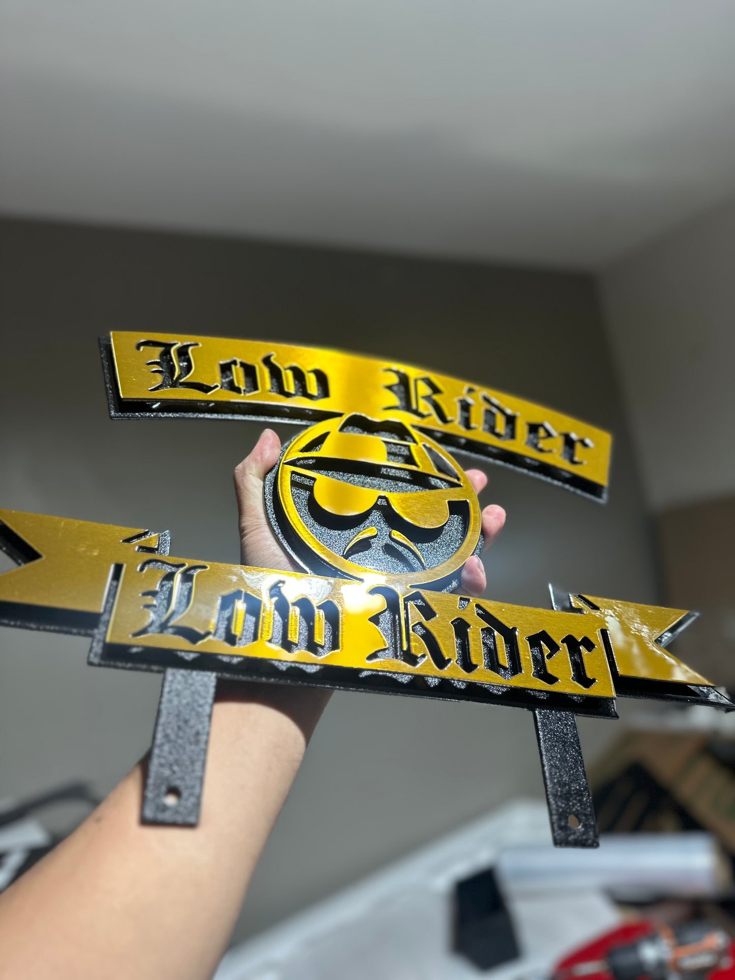 LOWIDER PLAQUE W/ LOWRIDER POWDER COATED BLACK AND GOLD 17x12 Inches
