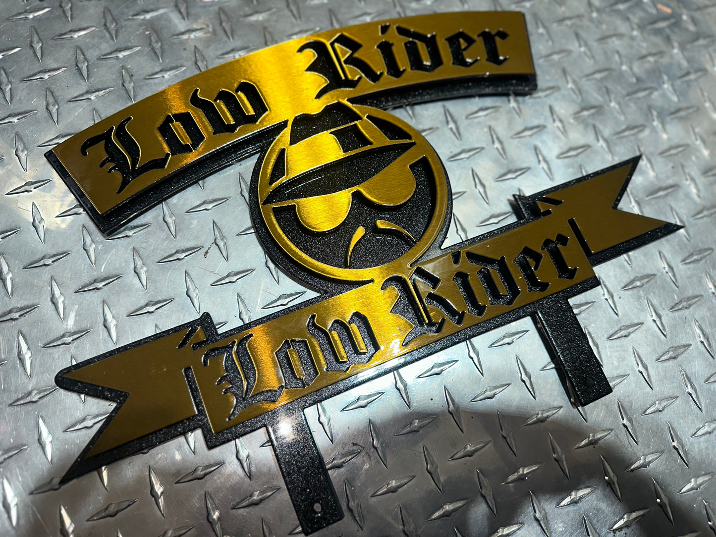 LOWIDER PLAQUE W/ LOWRIDER POWDER COATED BLACK AND GOLD 17x12 Inches